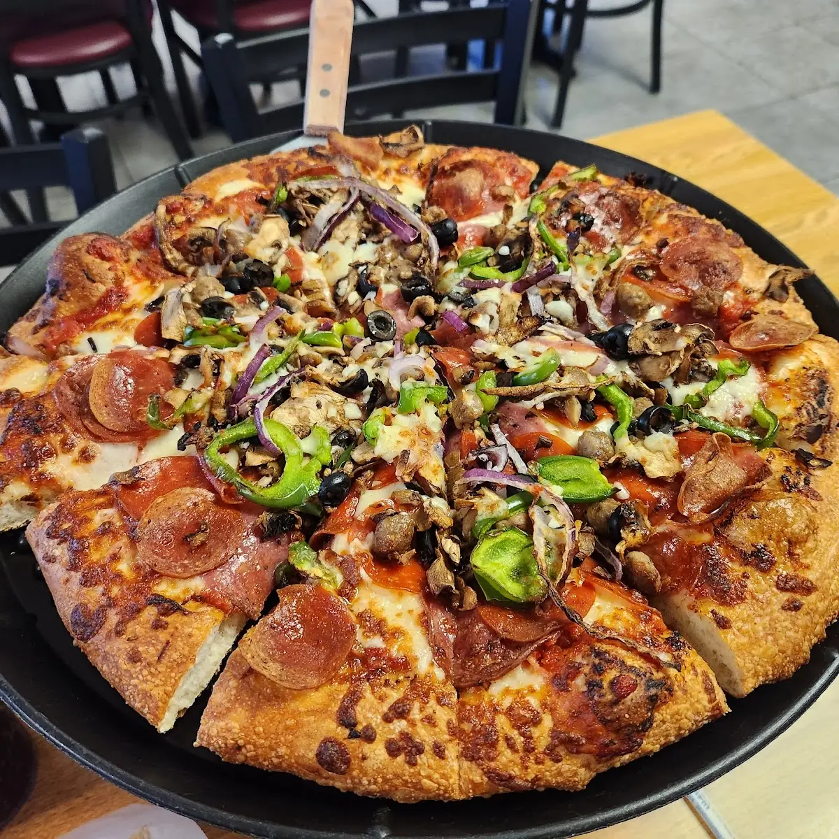 14 Stratton's Combo Supreme Pizza