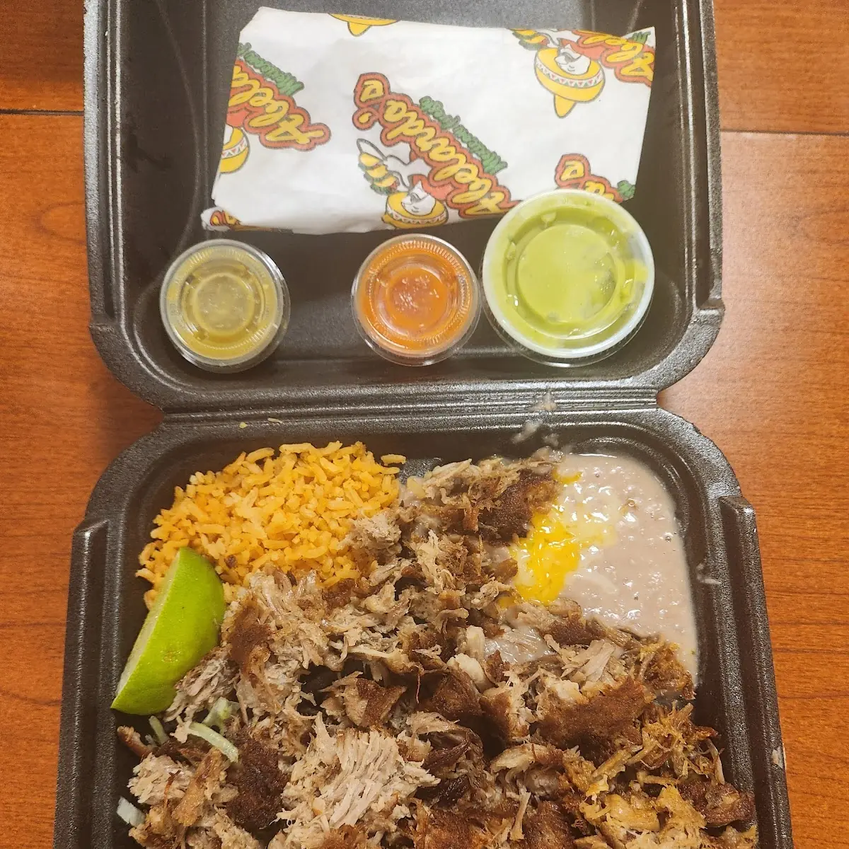Carnitas Plate with Rice and Beans Pulled Pork Served with Guacamole and Salad