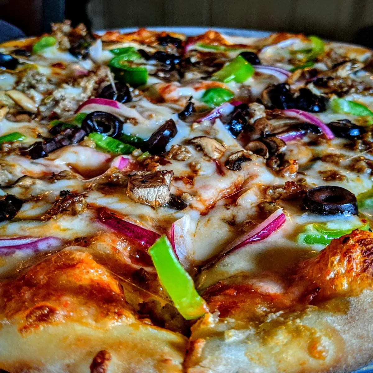Green Pepper Red Onion and Olive Pizza