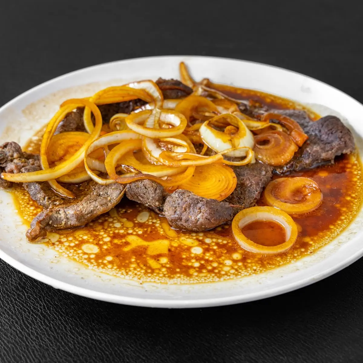 Bistec Encebollado Steak with Onions