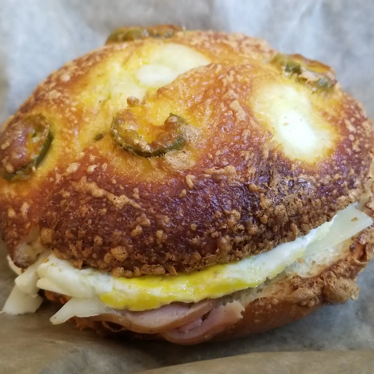 Ham Egg and Cheese on a Jalapeño Bagel