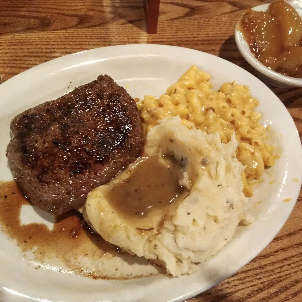 Roast Beef Dinner with Mashed Potatoes and Gravy and Mac and Cheese and Corn