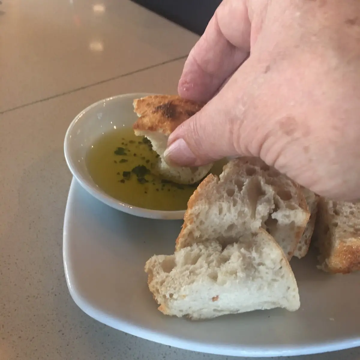 Sourdough Bread Chunks Dipped in Oliveoil
