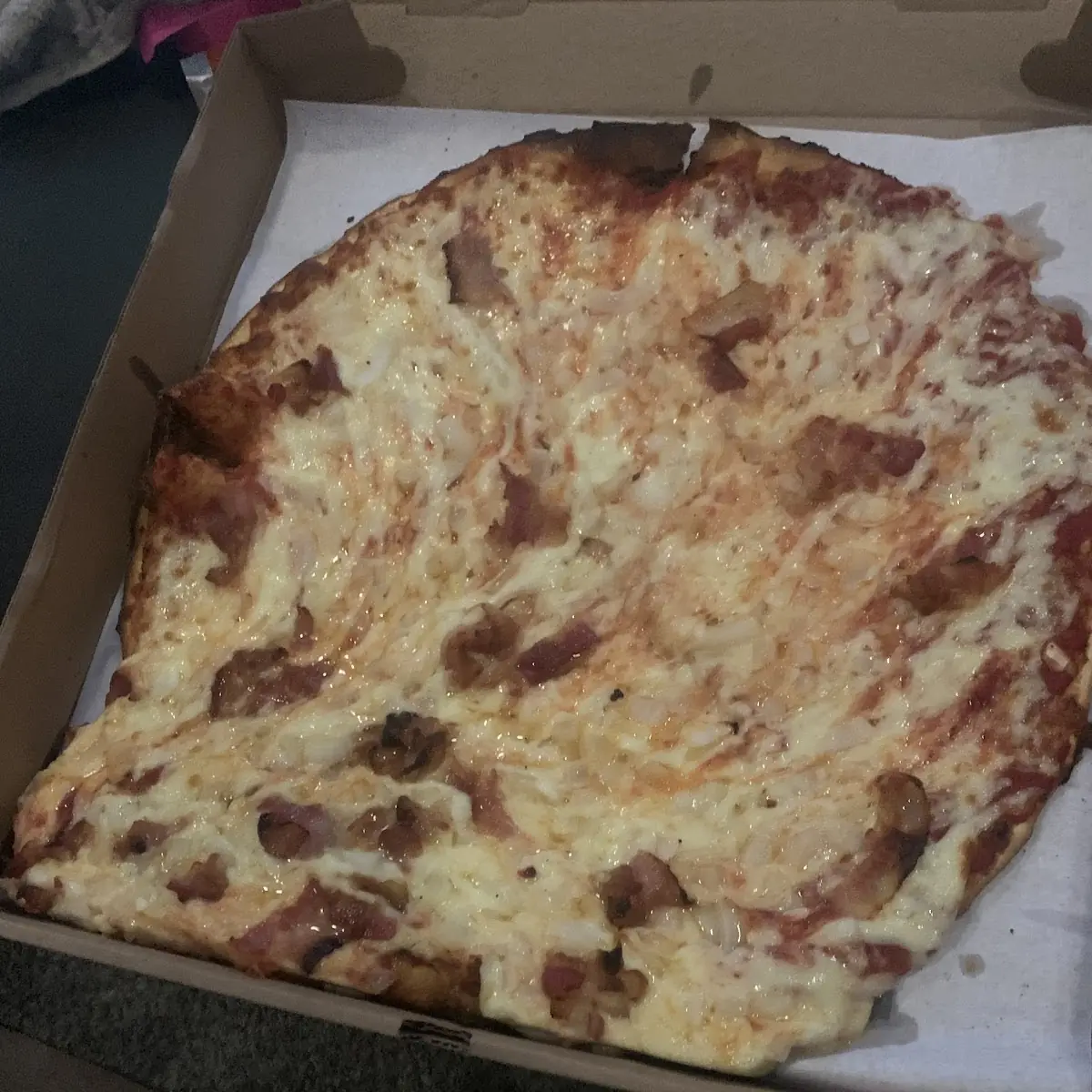 It Was a Cheese Pizza with Bacon & Onions