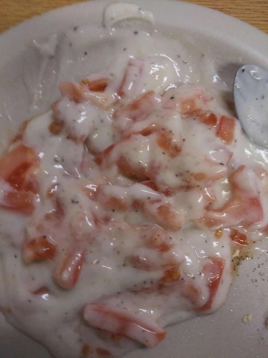 Tomato Slices Covered in Gravy