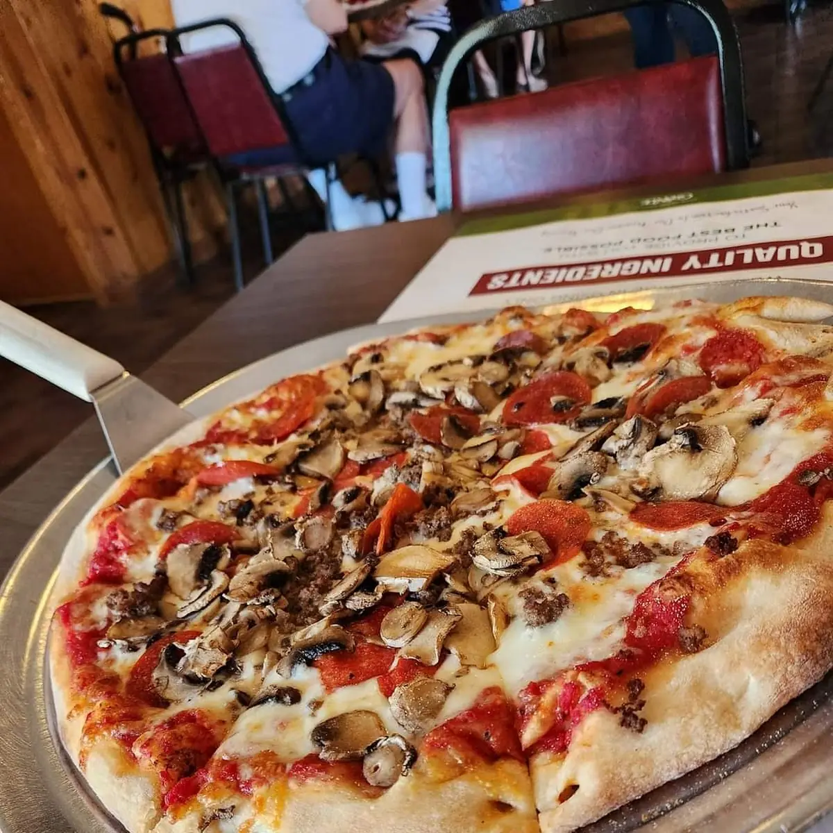 Regular Crust Pizza with Ground Beef Pepperoni and Mushrooms