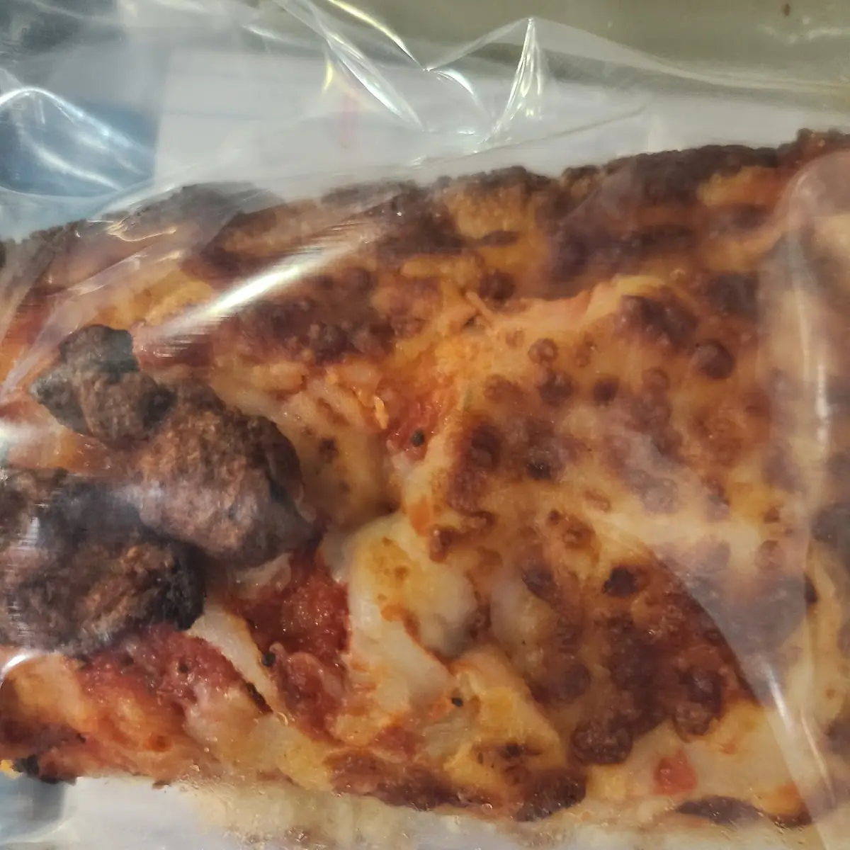 Detroit Style Sausage Pizza Slice