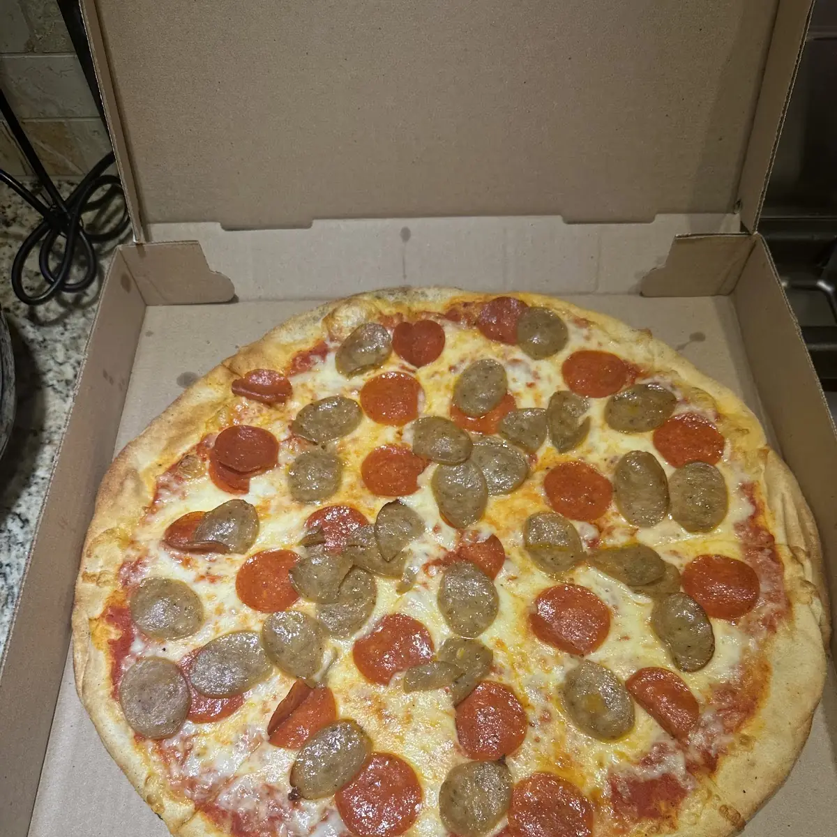 Thin Crust Pepperoni and Sausage Pizza