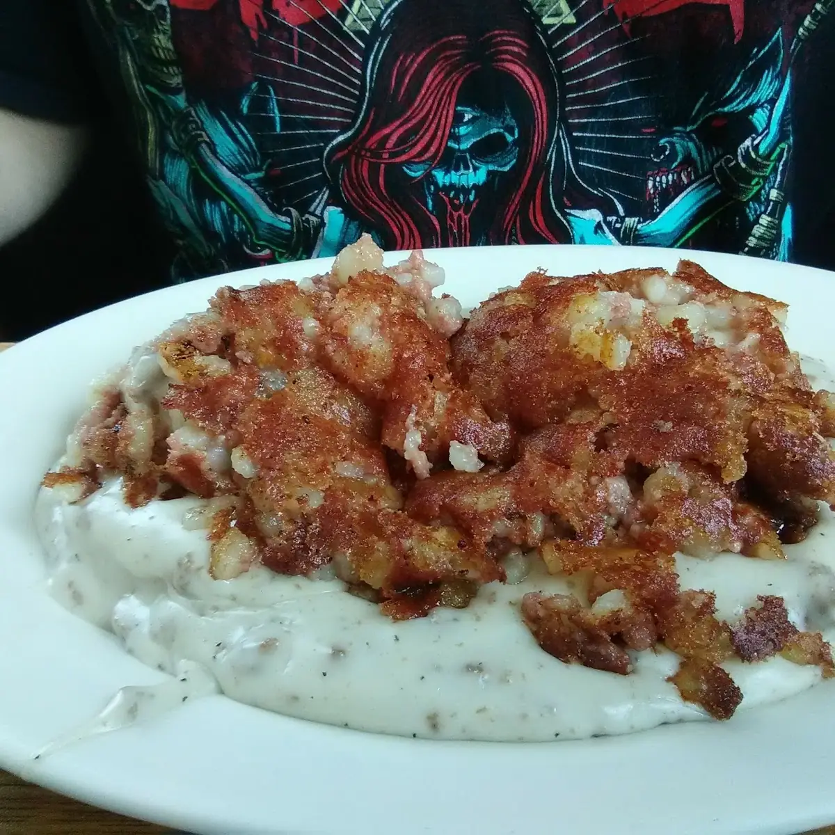 Biscuits and Gravy Topped with Corned Beef Hash