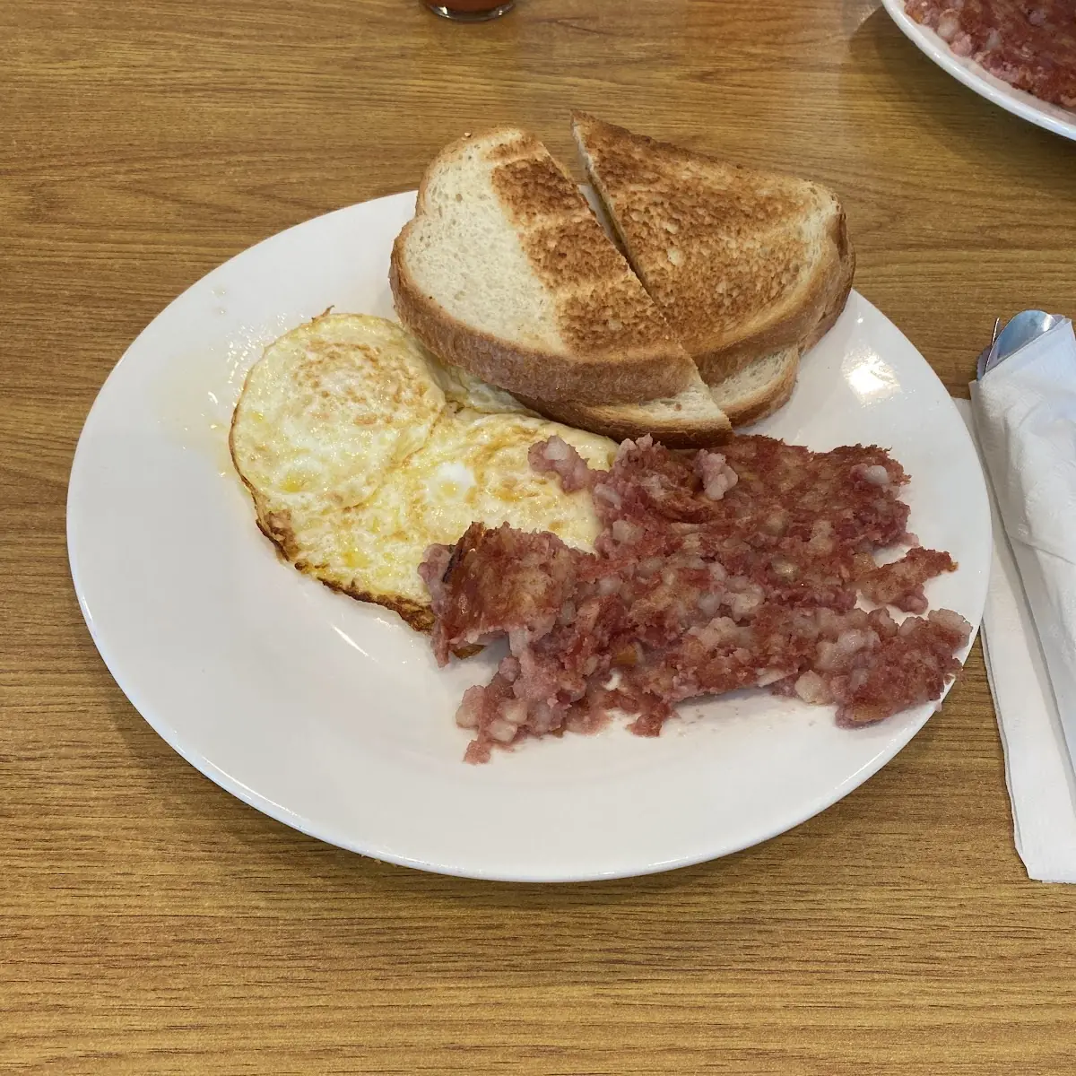 Corn Beef Hash and Eggs over Medium