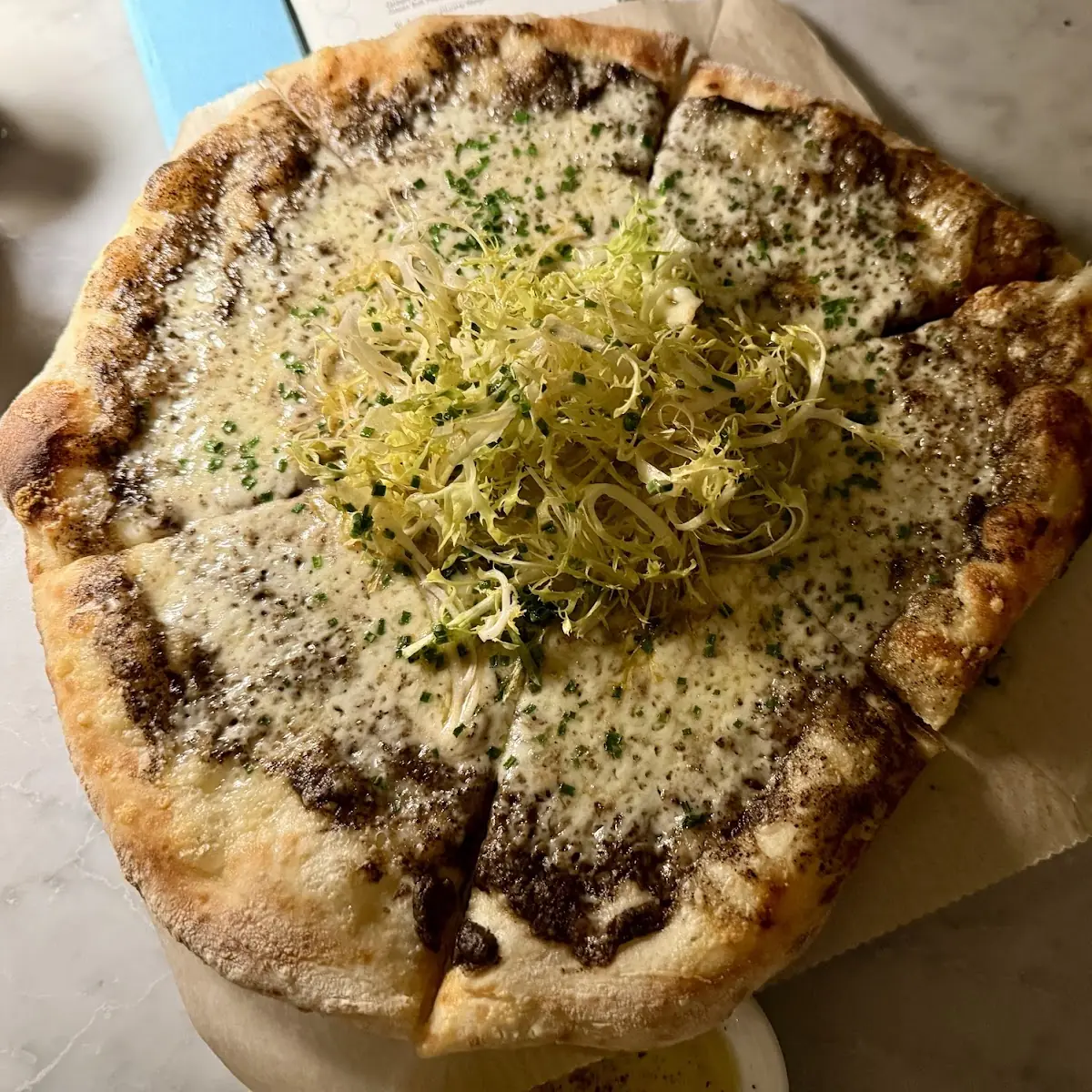 Thin Crust Pizza with Cheese and Greens
