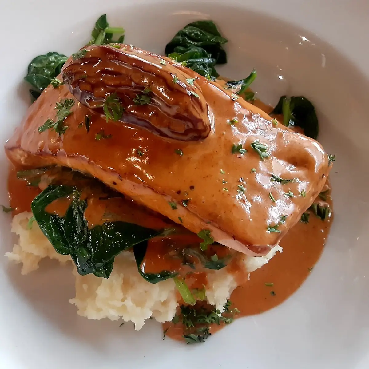 Salmon with Grilled Spinach and Chipotle Sauce over Mashed Potatos♡ Heavenly