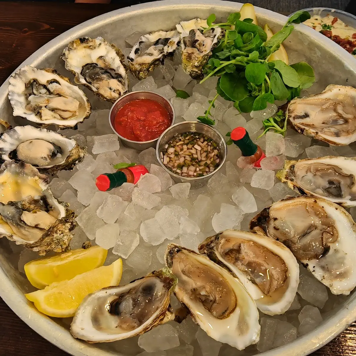 Fresh Raw Oysters with Lemon and Sauce