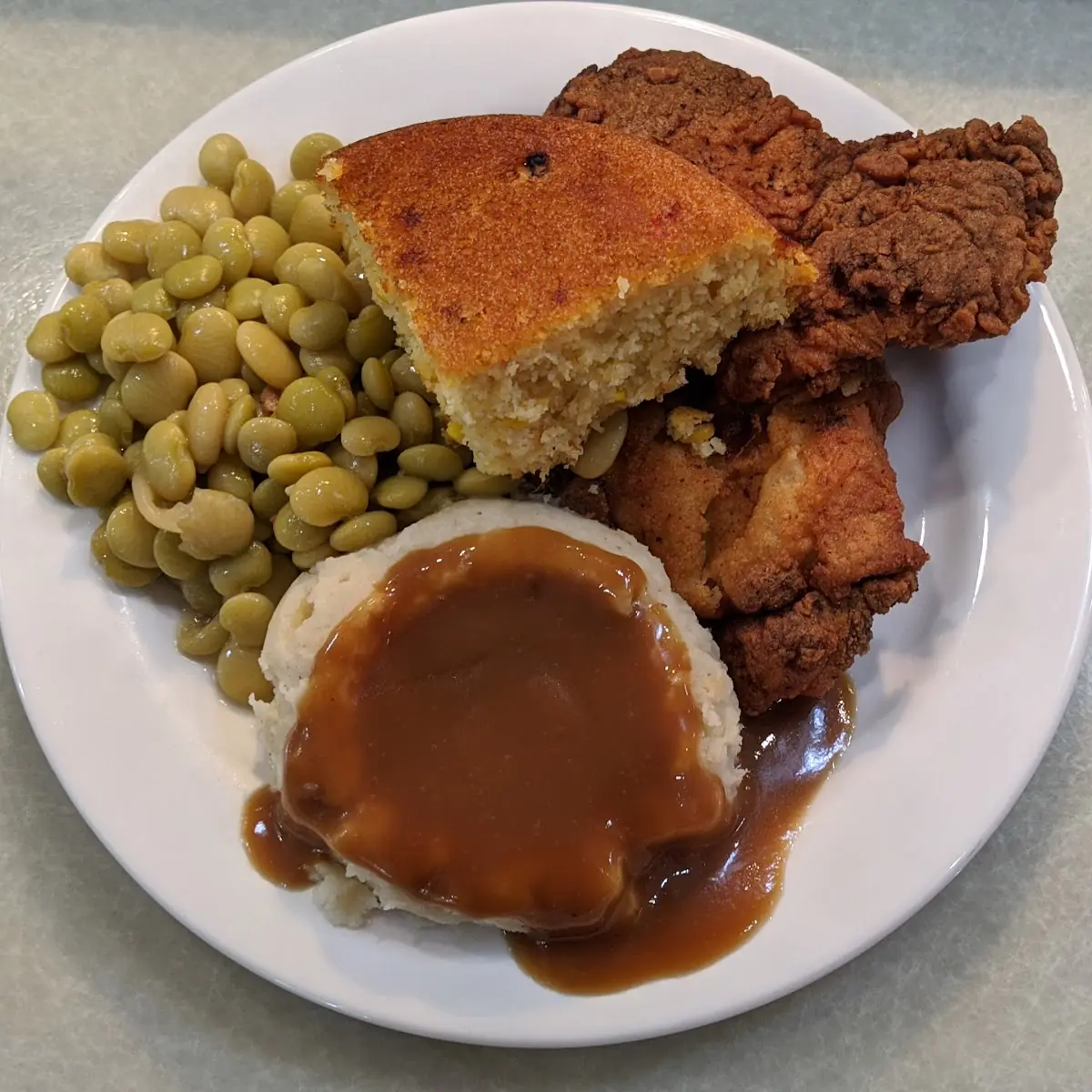 Pork Chop Lunch with Two Sides and a Bread