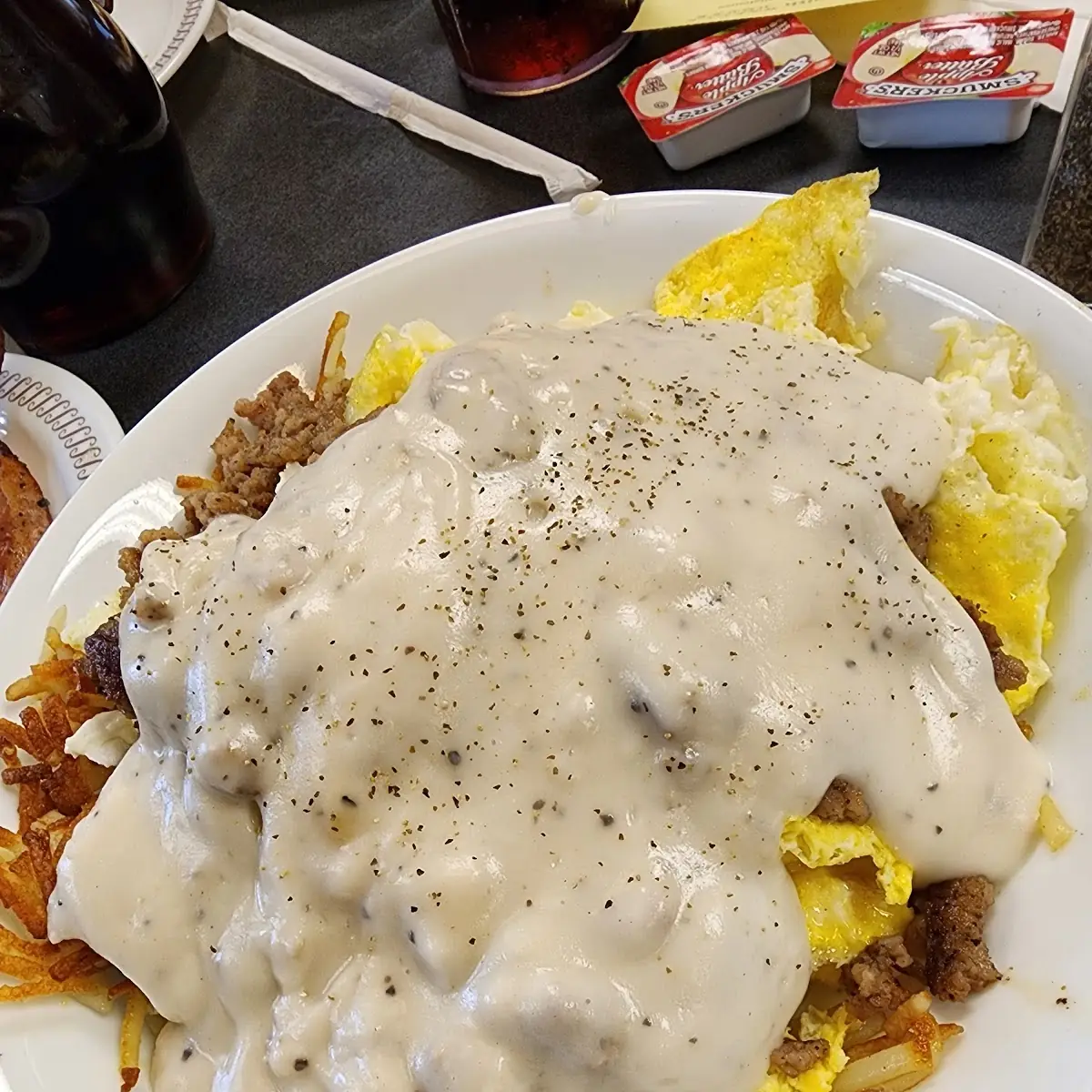 Two Biscuits & Gravy Two Eggs on the Side & Beverage