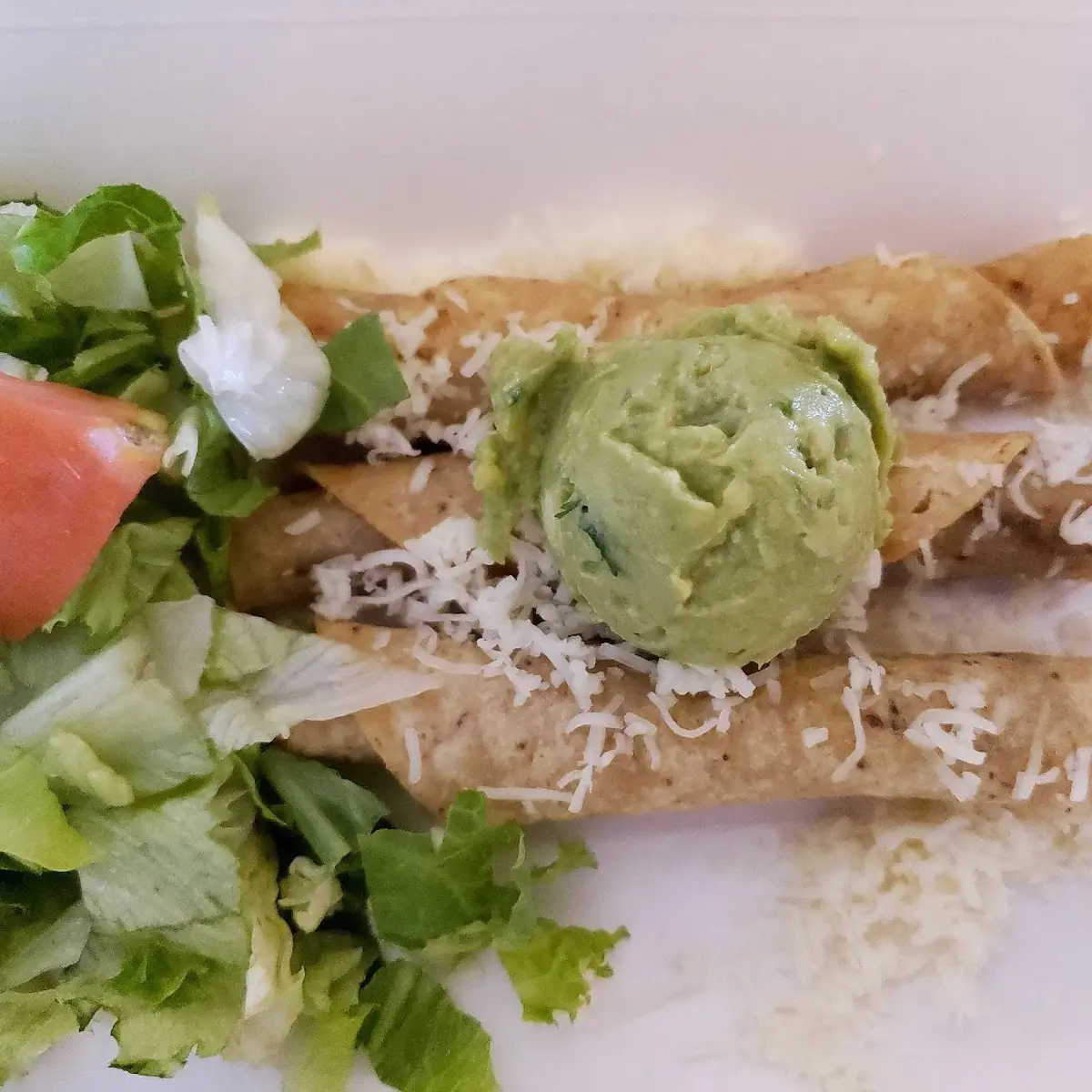 Rolled Tacos with Guacamole and Cheese