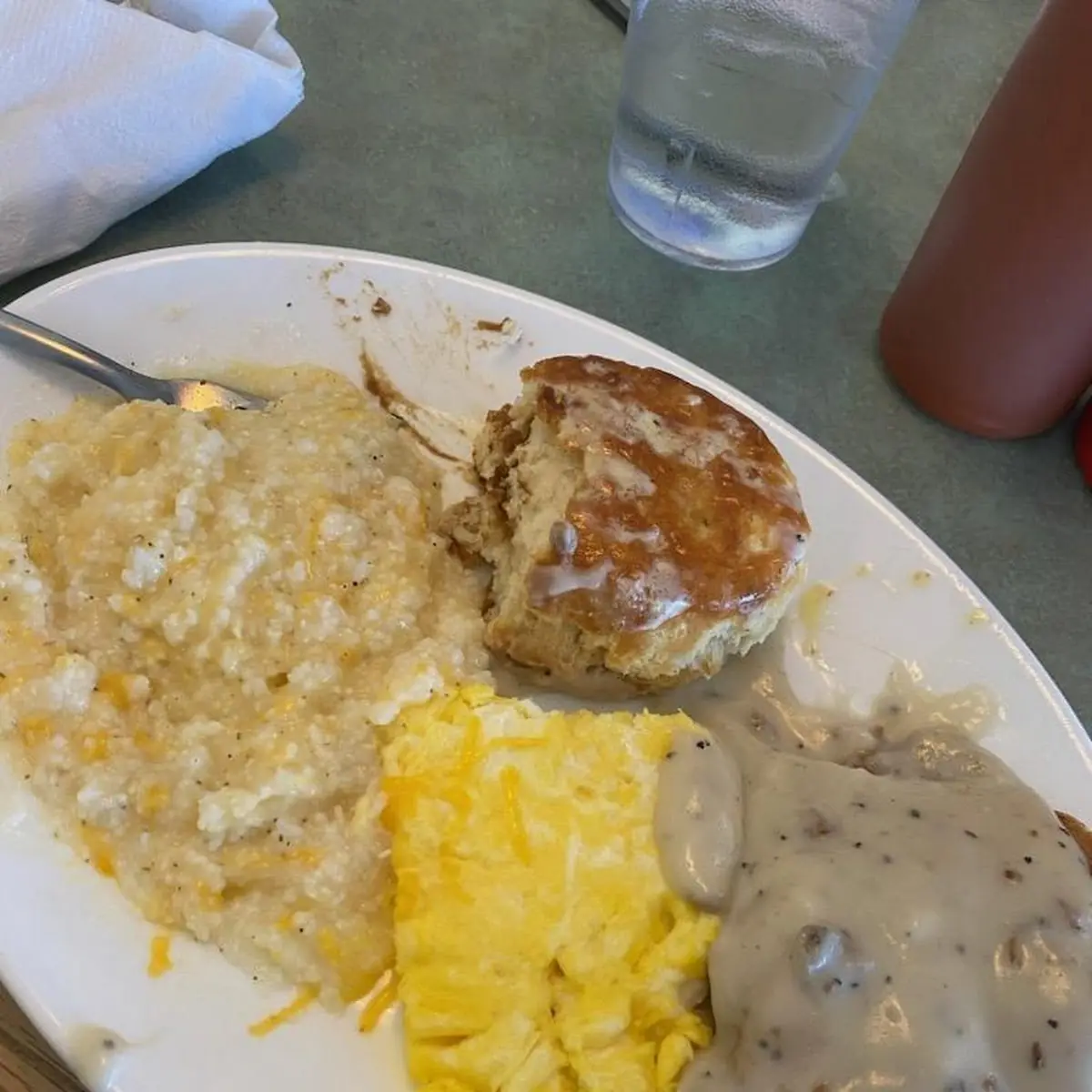 Country Fried Steak with Grits and Egg