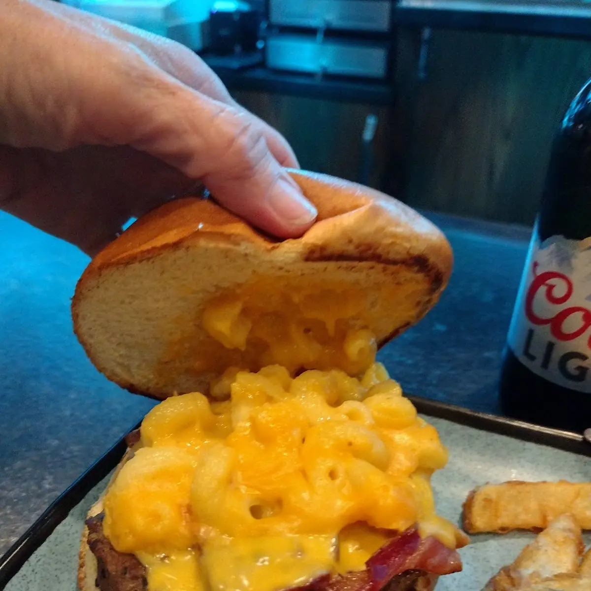 Bacon Cheeseburger with Mac and Cheese on It and Fries