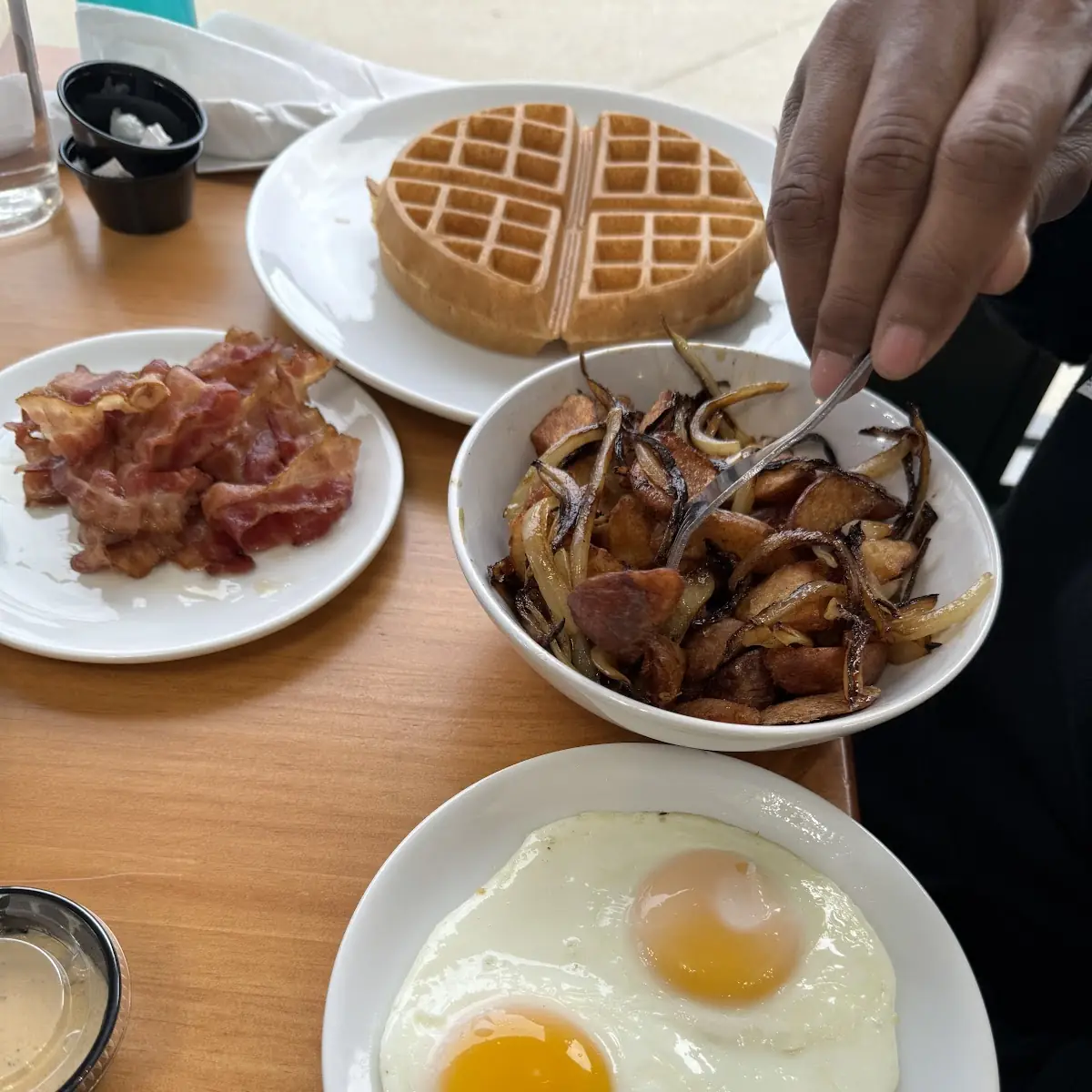 Two Eggs Scrambled with White American Cheese Turkey Sausage Strawberry Waffle Hash Browns