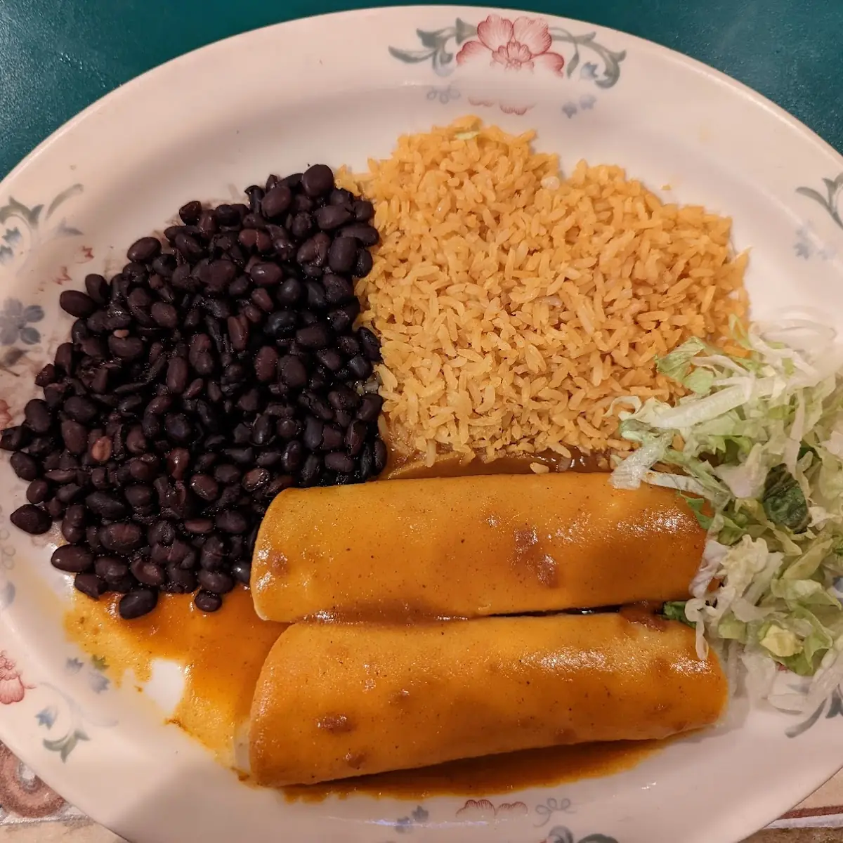Two Enchiladas Black Beans and Rice