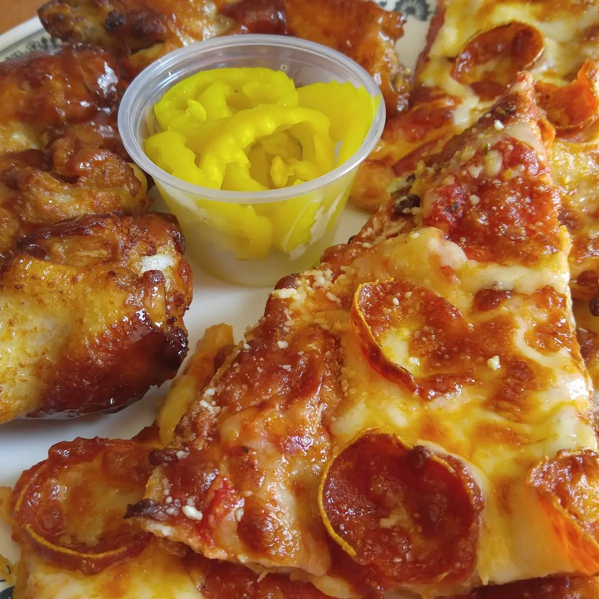 Pepperoni Pizza and Chicken Wings