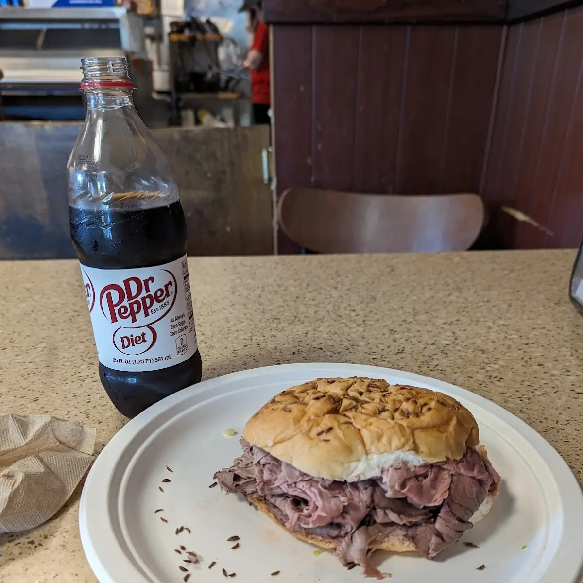 Store Cooked Angus Roast Beef Served on a Weck Roll Au Jus Gravy and Horseradish