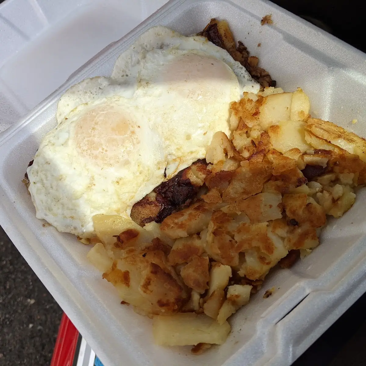Corned Beef Hash with Two Eggs over Easy and Home Fries