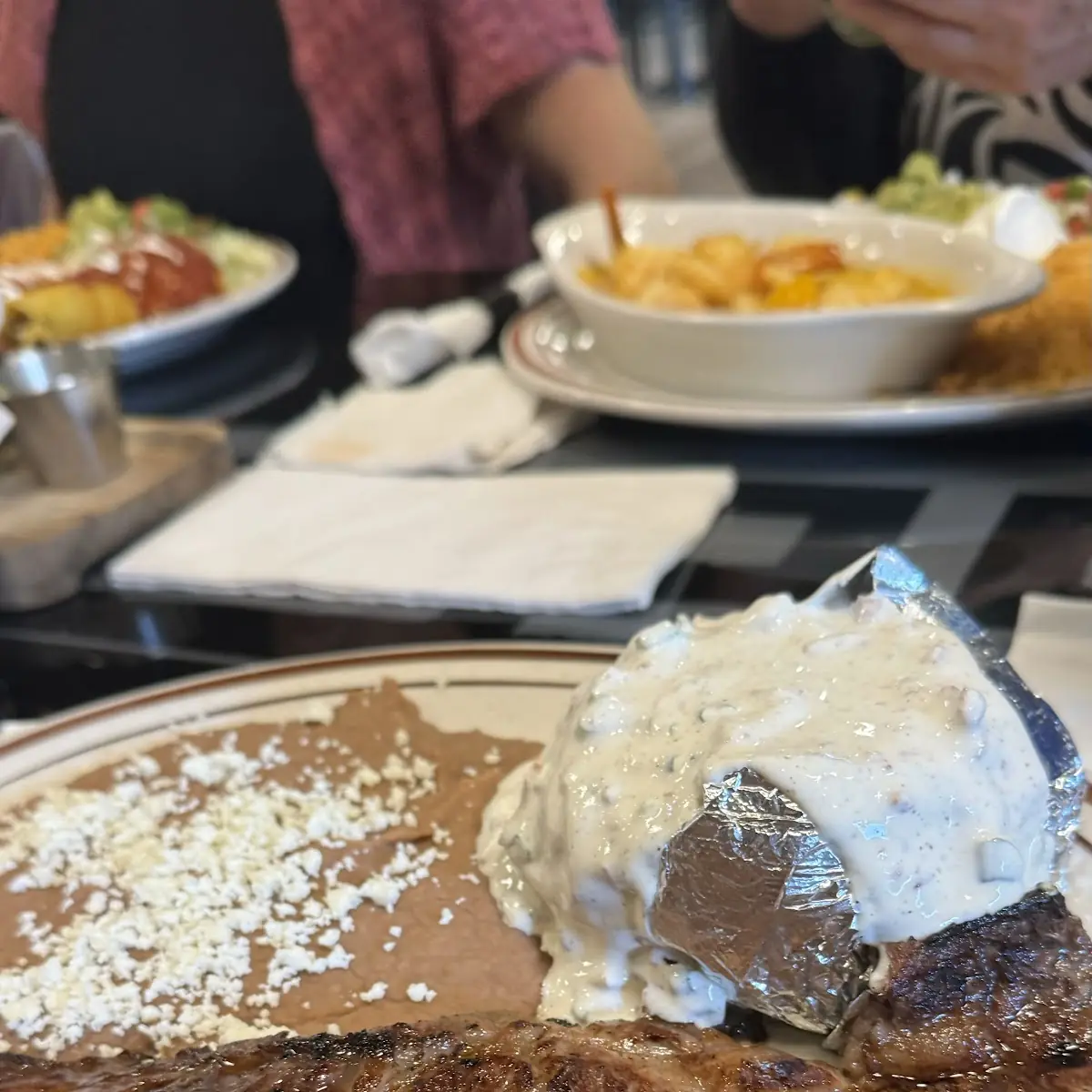 Ribeye with Baked Potato and Beans