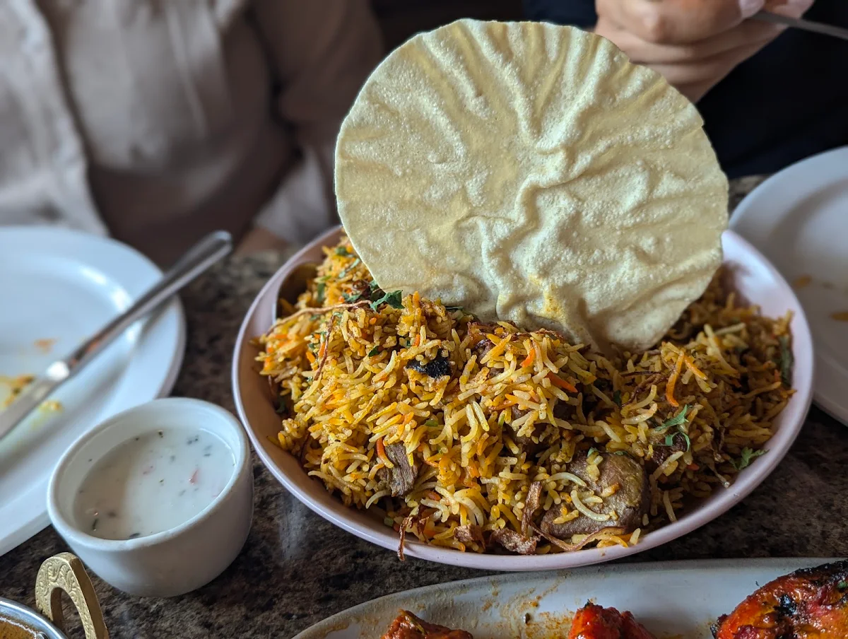 Chicken Biryani and Chicken Tikka Masala, Zyka Elevated Indian Restaurant Banff
