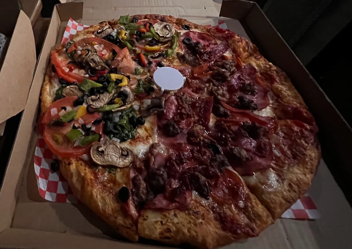 Half Veggie Half Meat Pizza