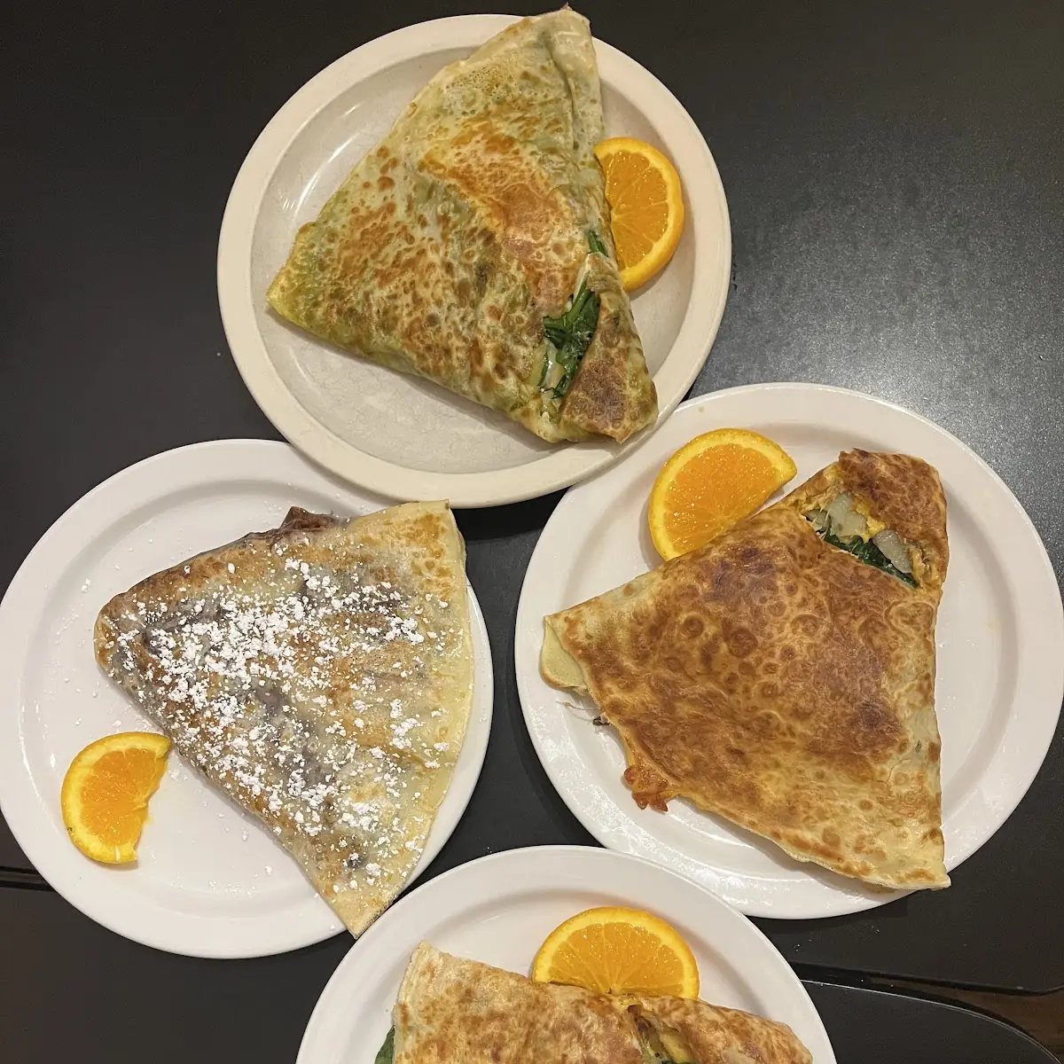 Fruit Crepes with Powdered Sugar