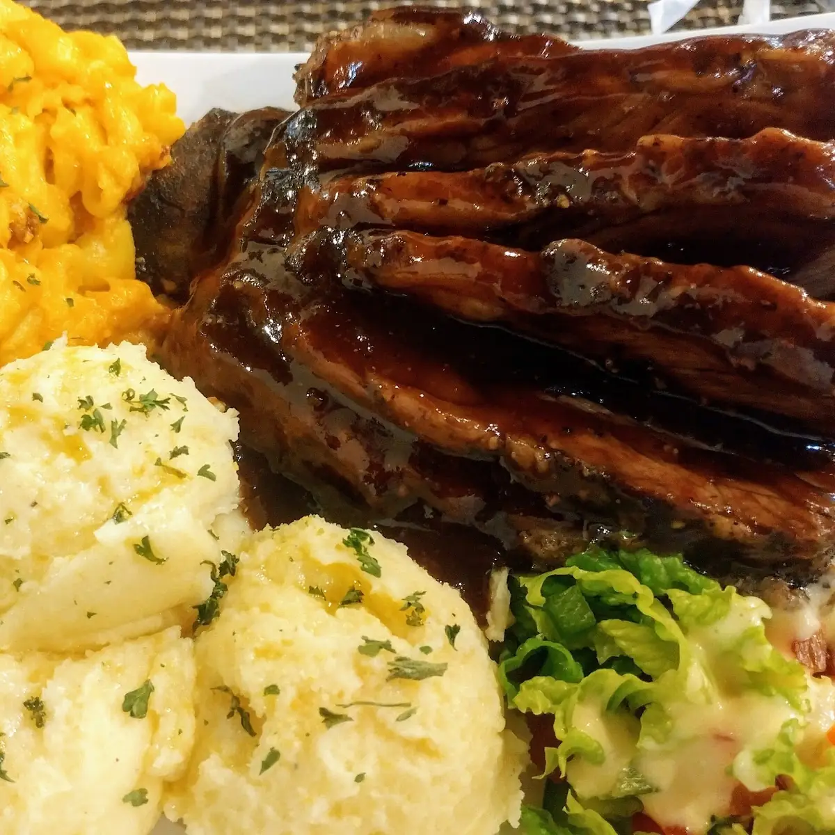 Beef Ribs Macaroni and Cheese and Garlic Mashed Potatoes