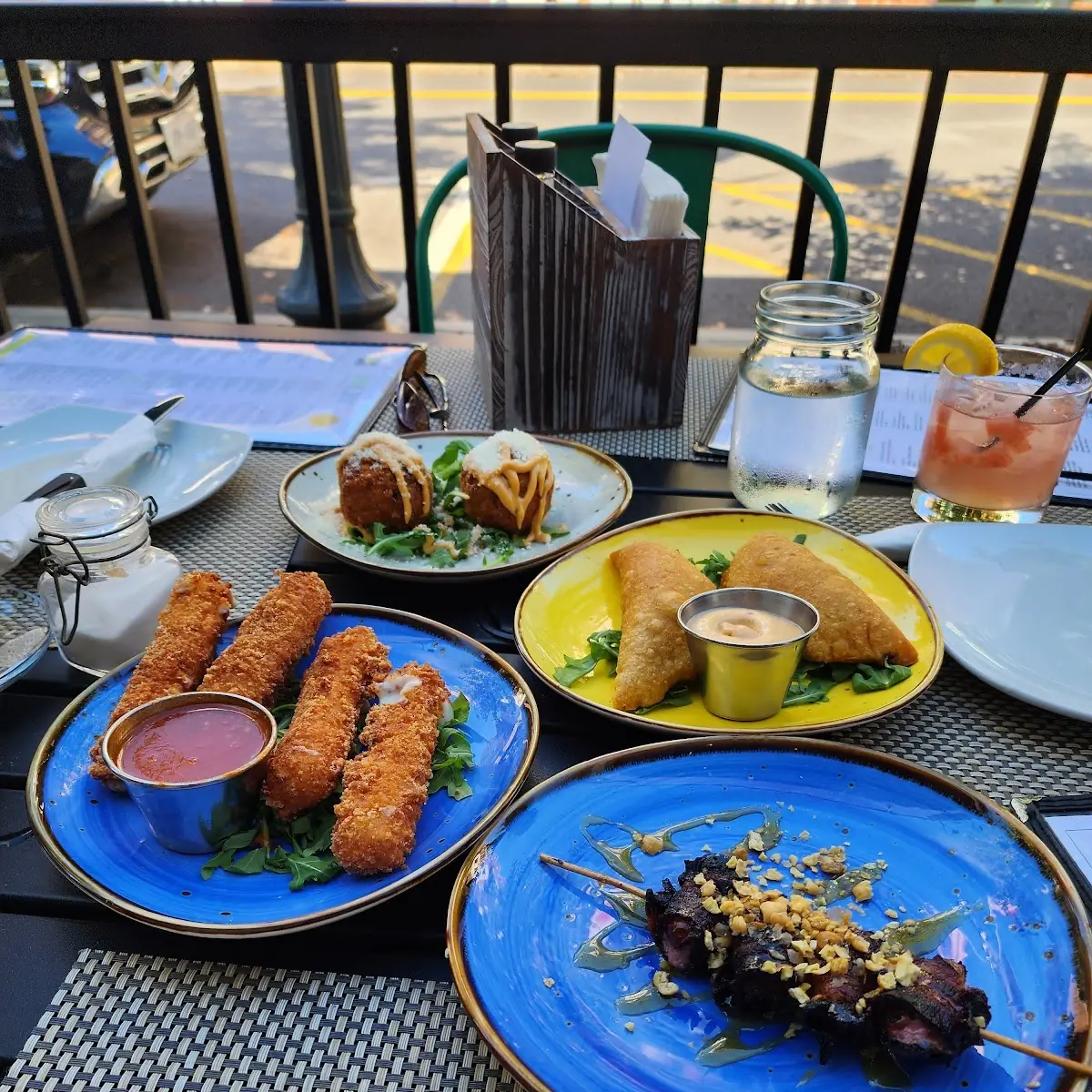 Rice Ball Empanadas Bacon-Wrapped Figs Mozzarella Cheese Sticks