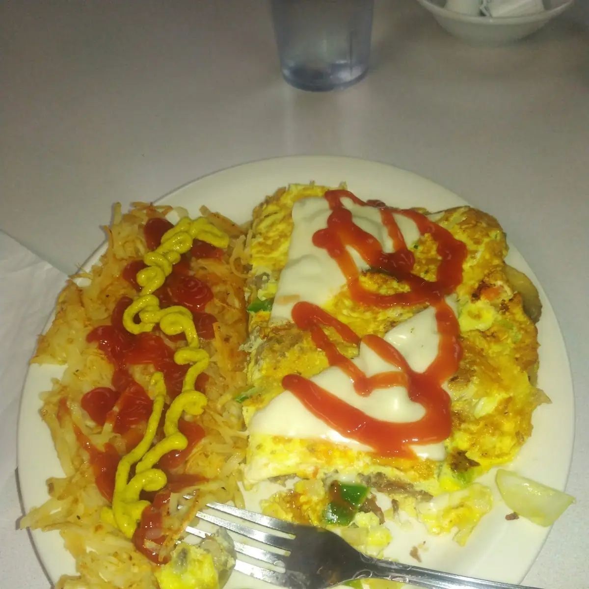 Philly Cheesesteak Omlet with Hash Browns
