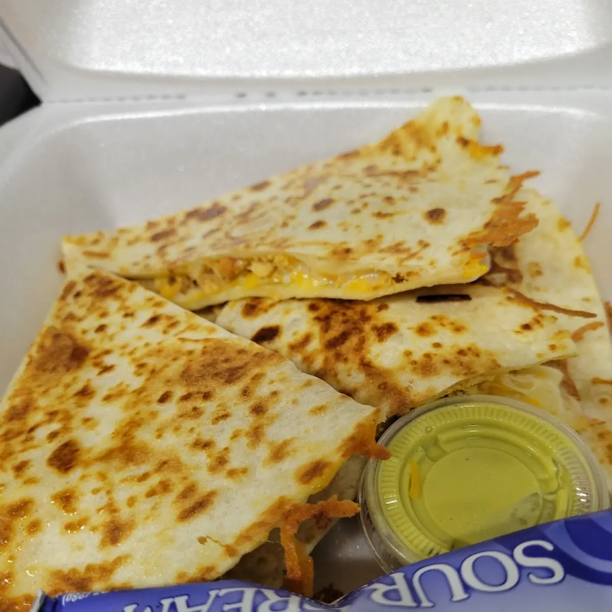 Cheese Quesadilla with a Side of Rice and Beans