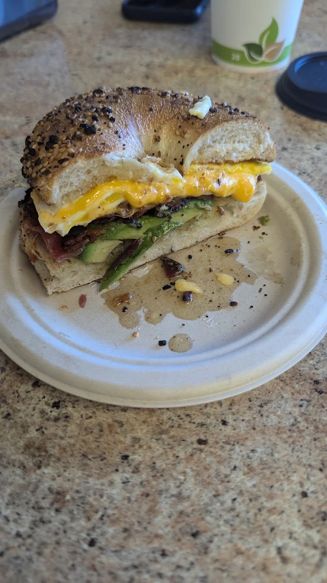 Bacon Egg and Cheese with Avocado on Toasted and Buttered Everything Bagel