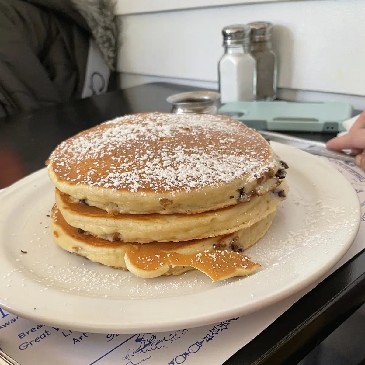 Stack of Chocolate Chip Pancakes with Syrup