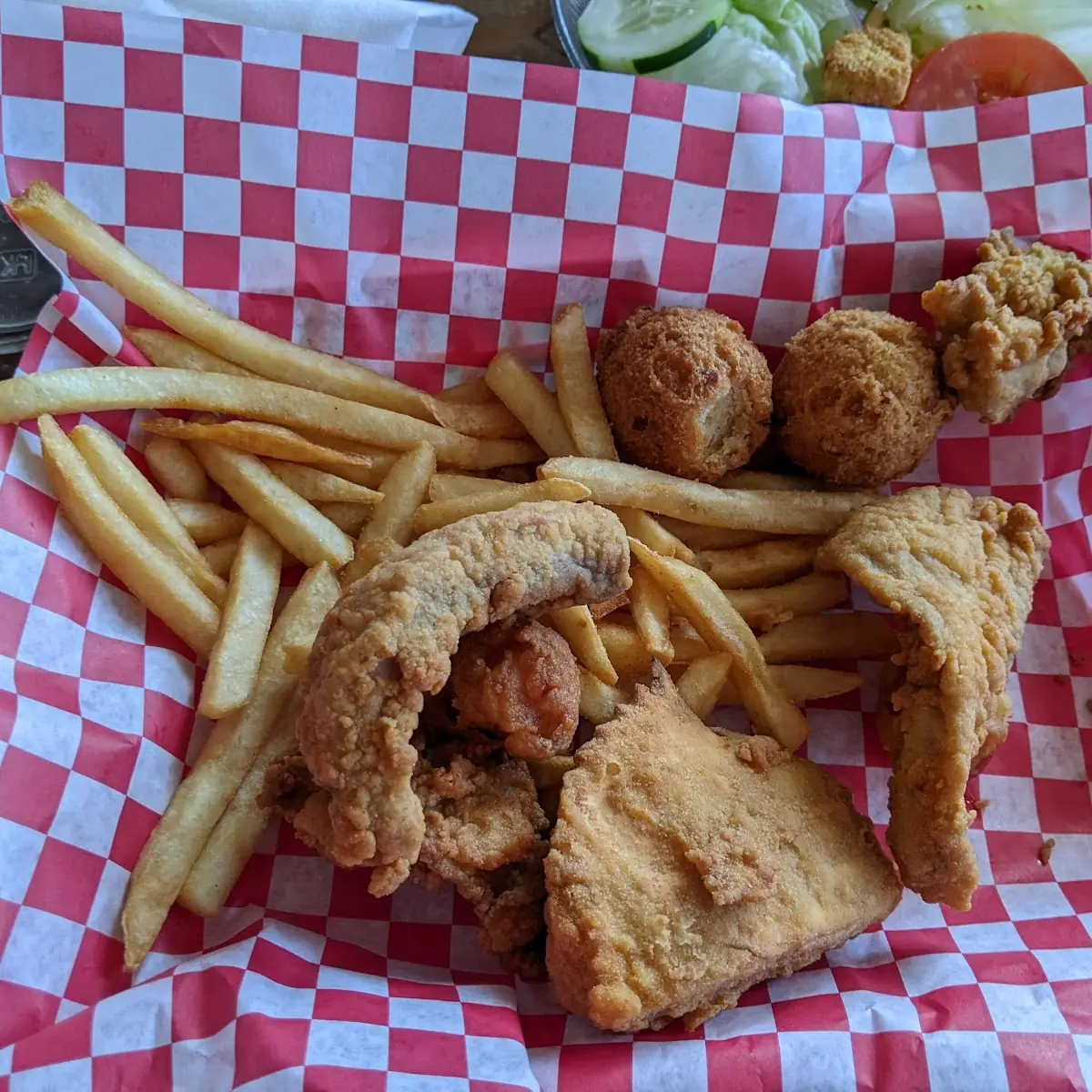 Combo Plate Shrimp Fish Scallop Deviled Crab and Oyster with Fries and Hush Puppies