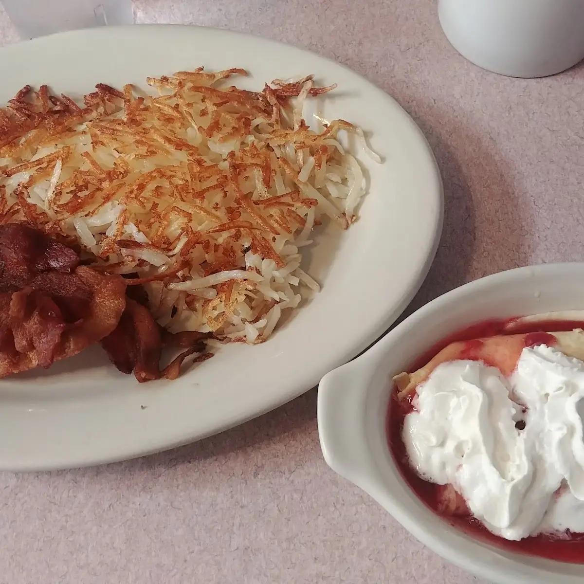 Strawberry Crepes Hash Browns and Crispy Bacon