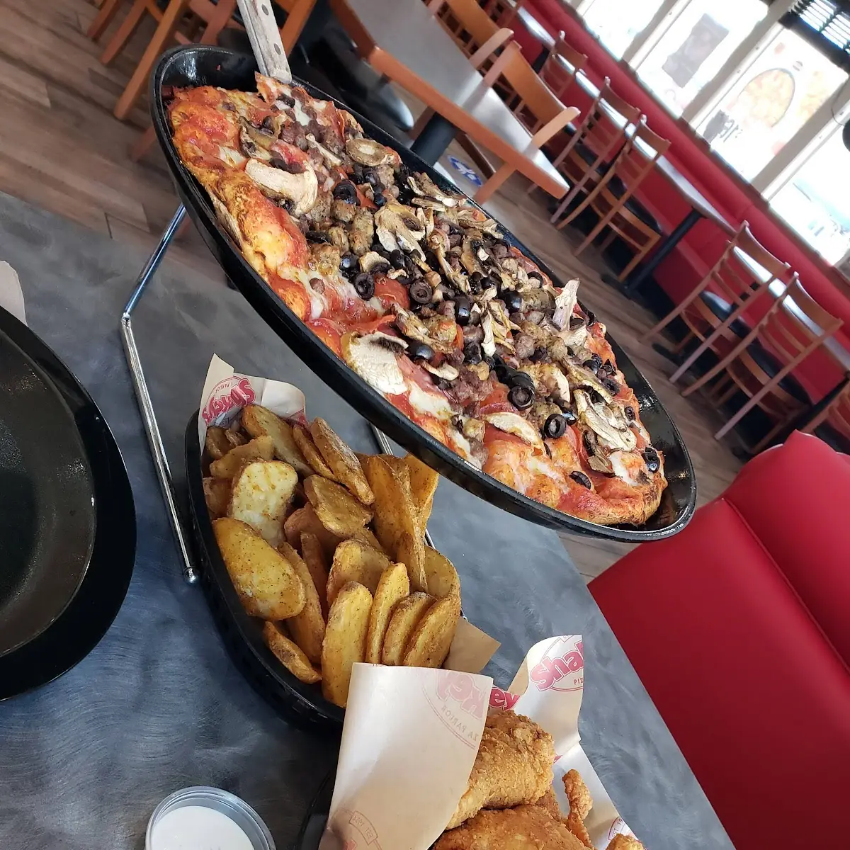 Supreme Pizza and Mojos
