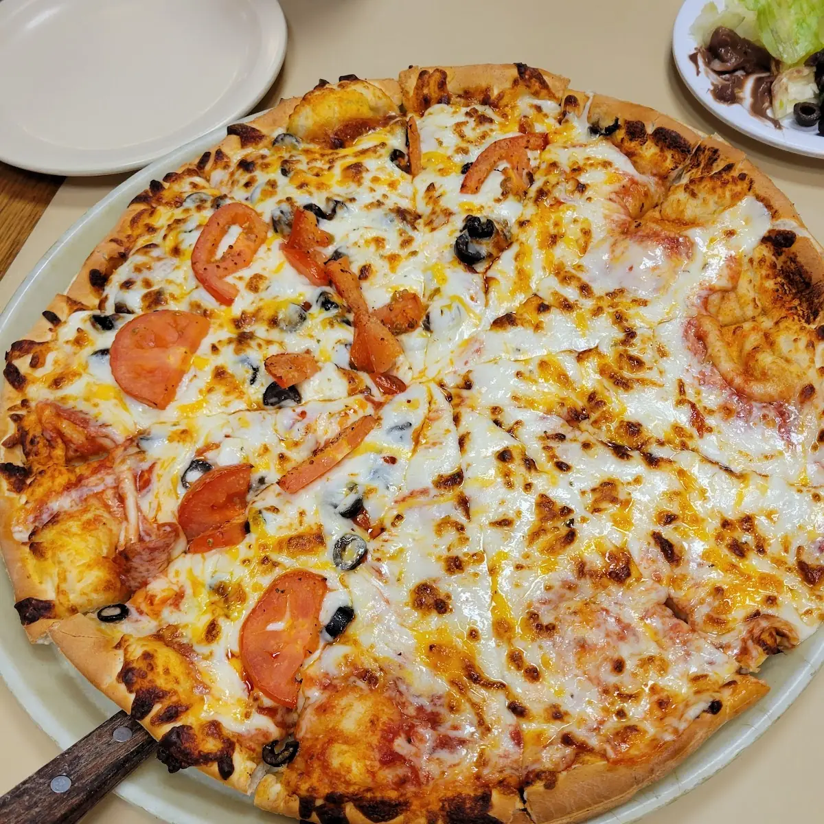 Pepperoni Black Olive Tomato Cheese Pizza