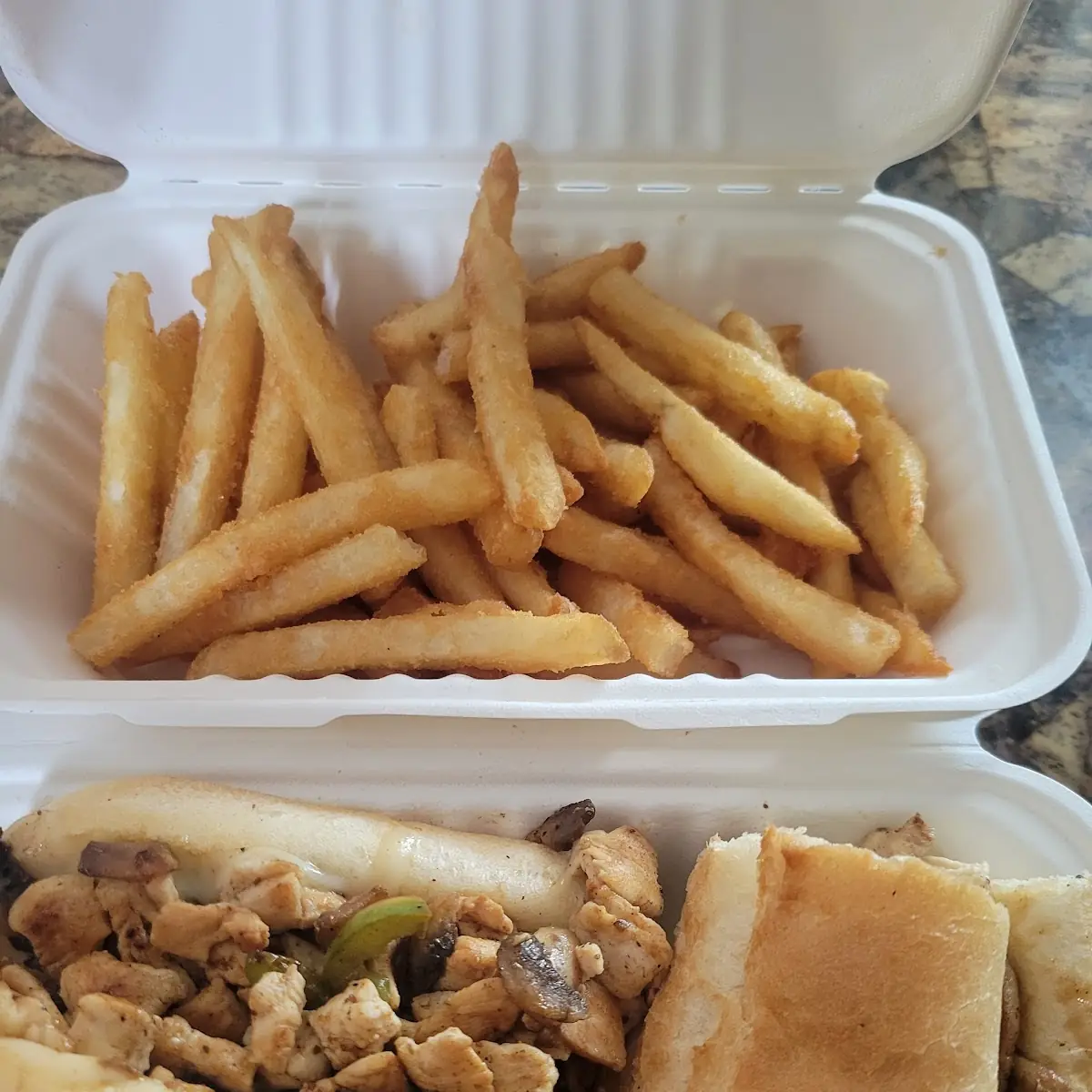 Chicken Philly Cheesesteak and Large Fries