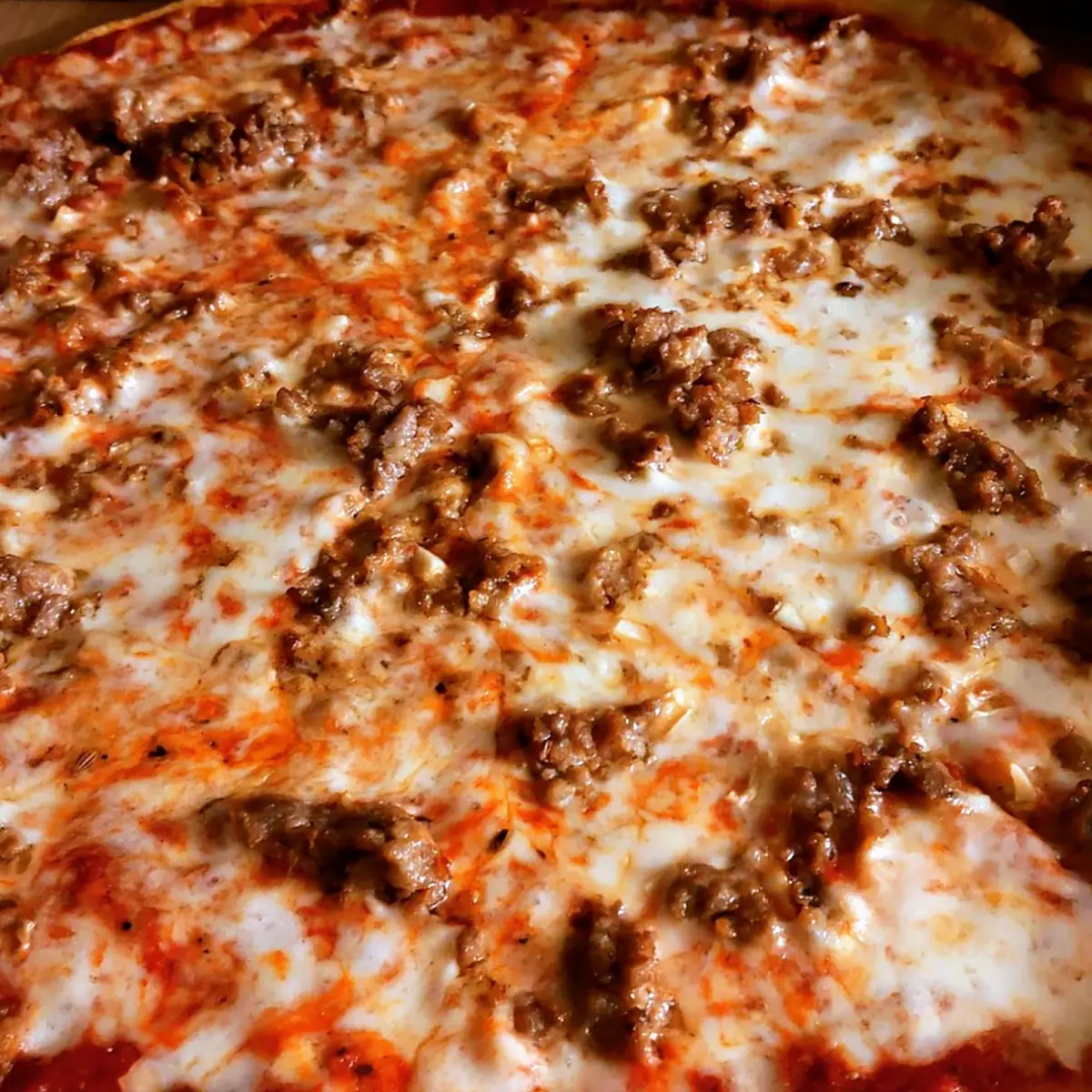 Sausage Pizza Extra Cheese Pizza