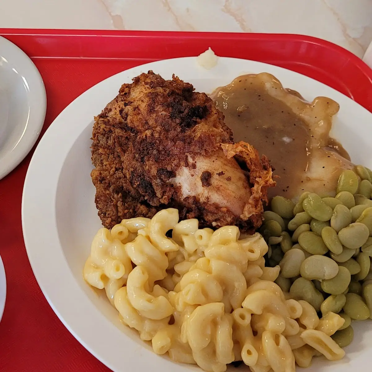 Fried Chicken Mashed Potatoes Lima Beans Pintos Mac and Cheese Brownie w Cream Cheese Icing
