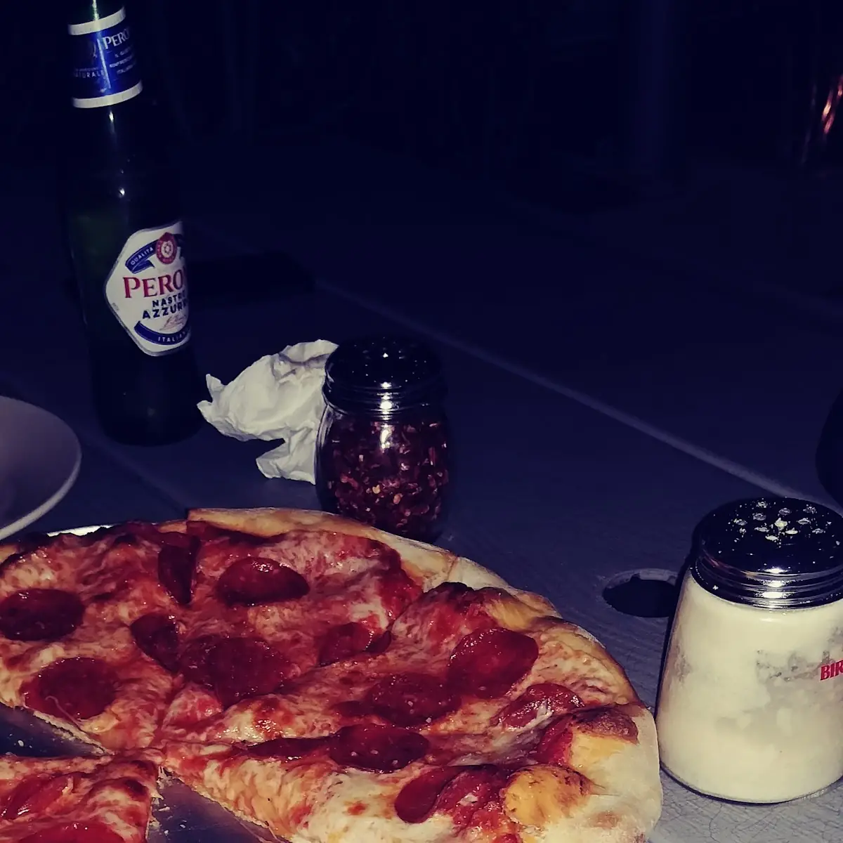 Pepperoni Pizza on Their Patio