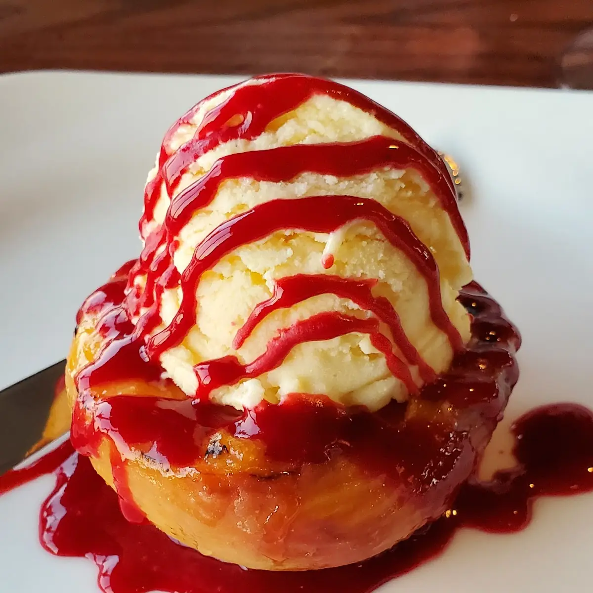 Baked Peach and Vanilla Ice Cream with Raspberry Coulis