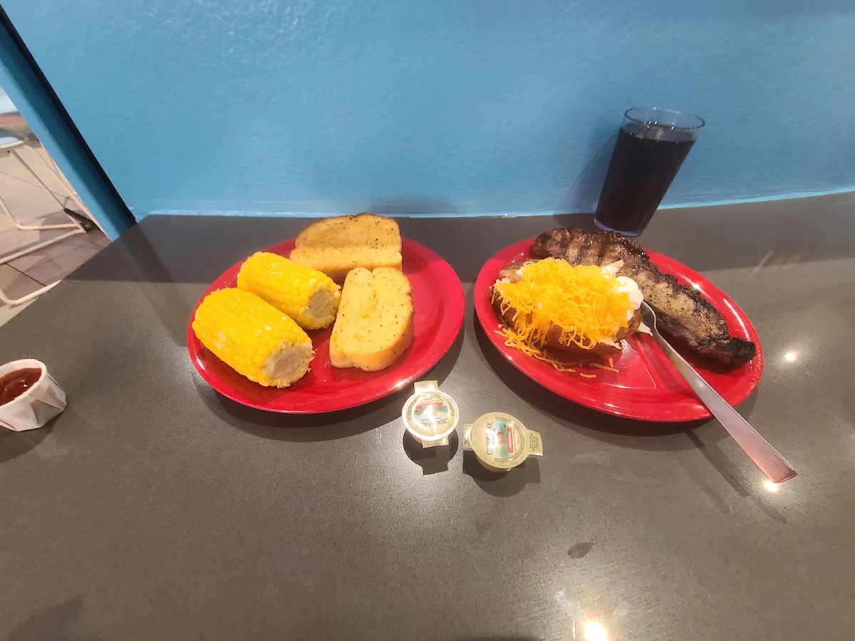 Steak Corn Baked Potato and Bread