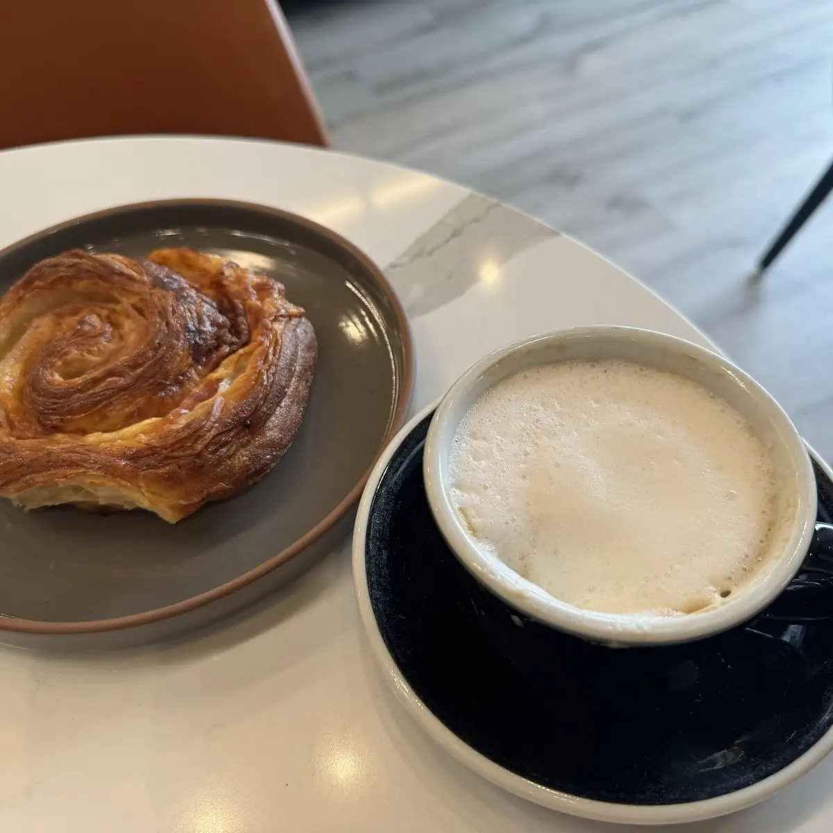 Cappuccino and Ham and Cheese Croissant