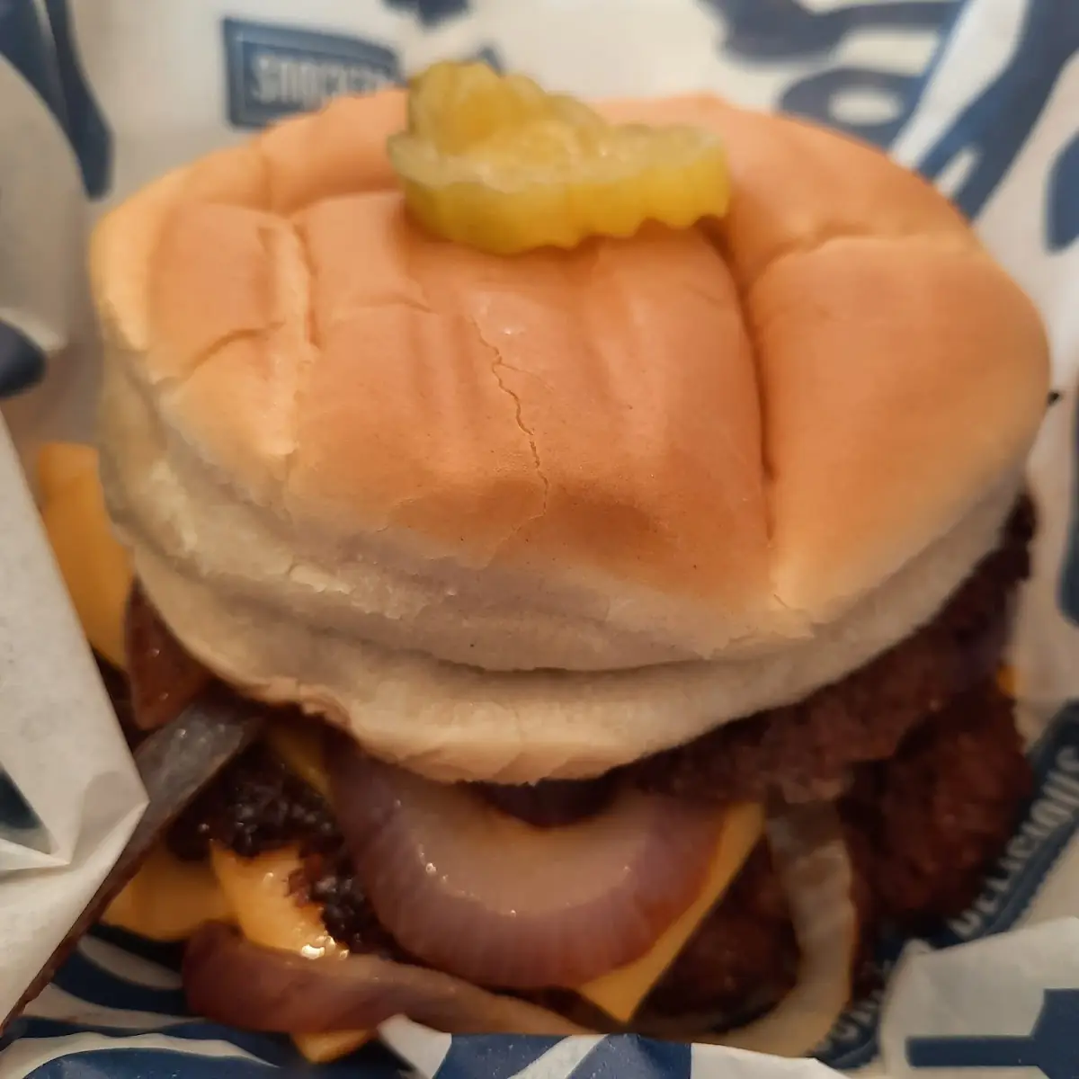 Triple Cheeseburger with Grilled Onions