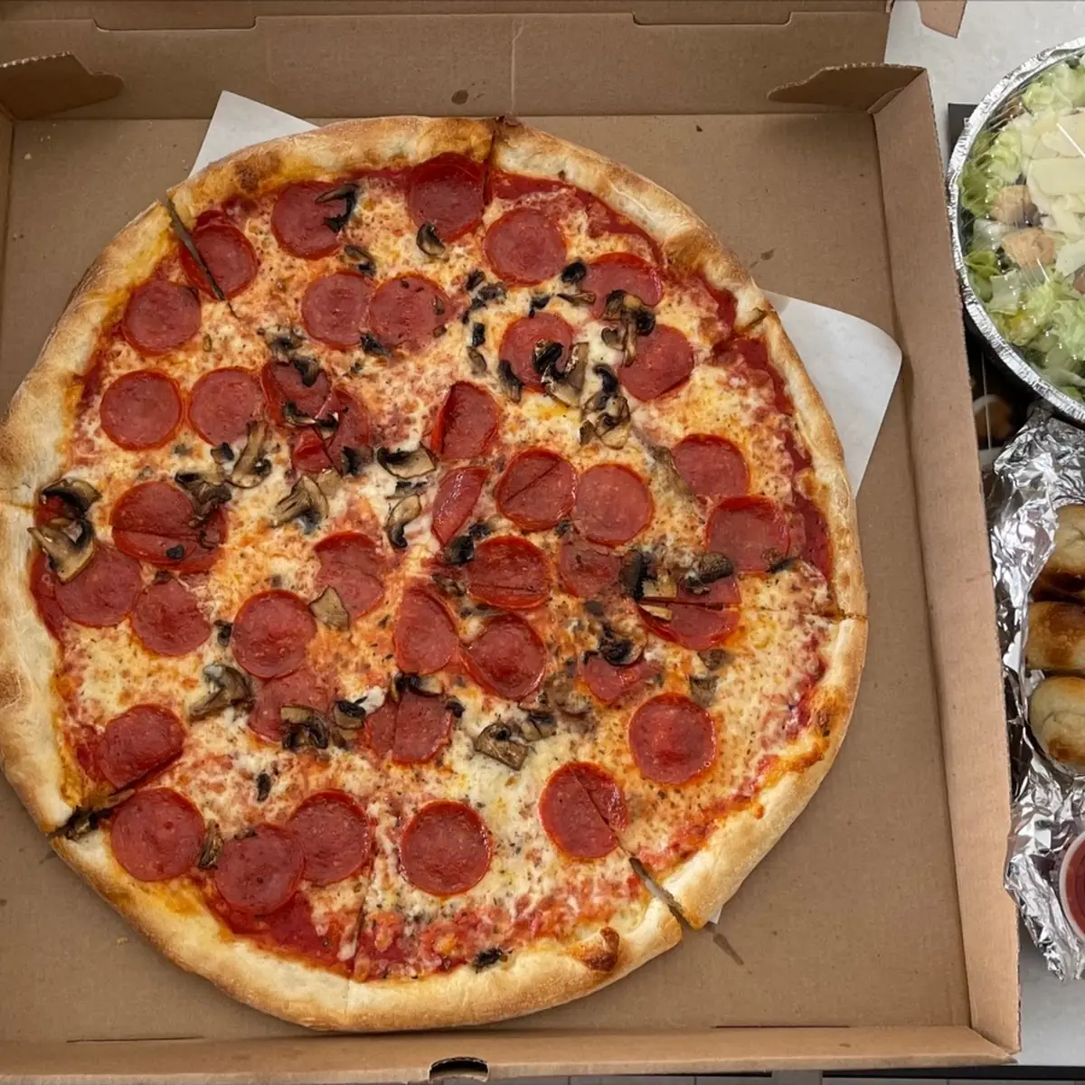 Pizza Garlic Knots and Caesar Salad